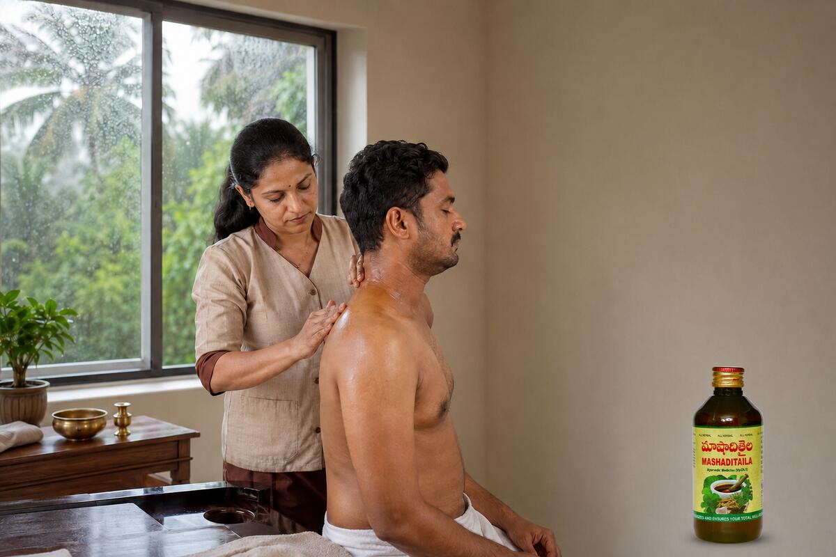 Indian Ayurvedic practitioner applying warm oil to a man’s neck as supportive care for wry neck and facial nerve weakness during monsoon weather.
